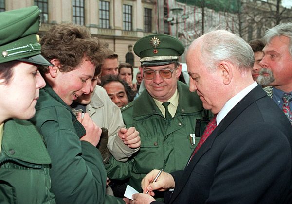 Gorbachev signs autographs