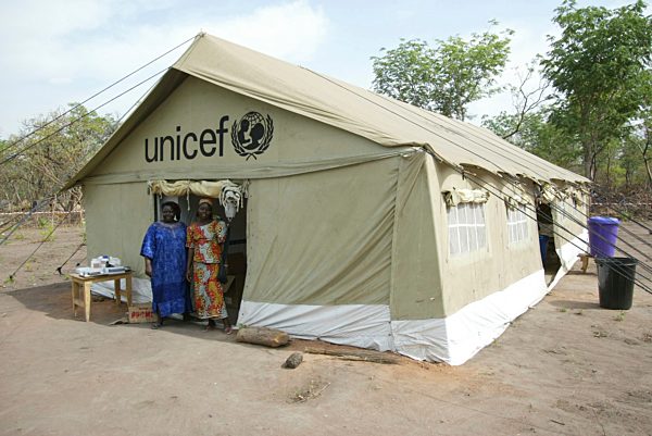 Women outside a Unicef tent in a refugee camp in Chad. The fighting in the Central African Republic (CAR) is a forgotten conflict in which village after village is being destroyed in the north of CAR and burned down by government troops as a way of punish
