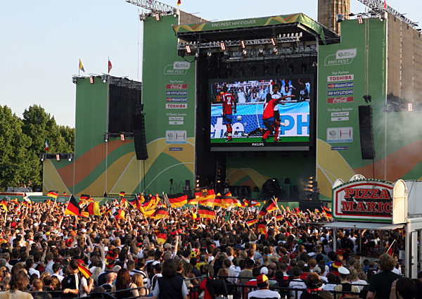 Some 20.000 German supporters wave with flags on the Waterlooplace public...