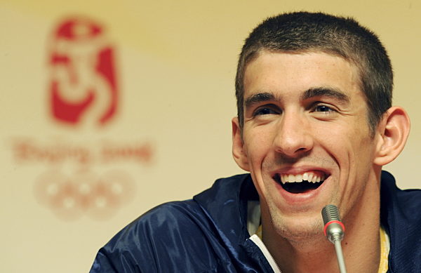 Swimmer Michael Phelps from the USA attends a press conference during the...