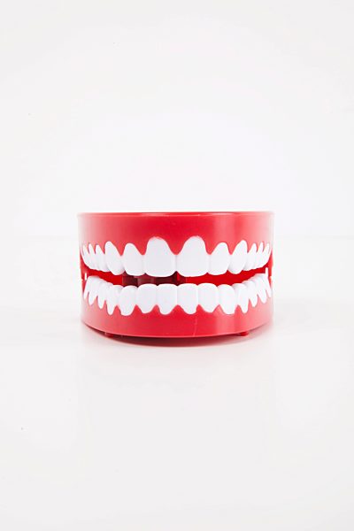 Artificial dentures over white background