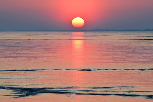 Red disc of the setting sun, Germany