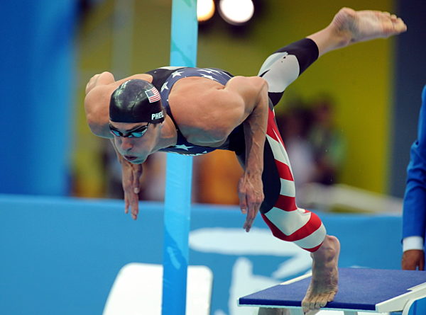 US swimmer Michael Phelps is starting to win his third gold medal at the...