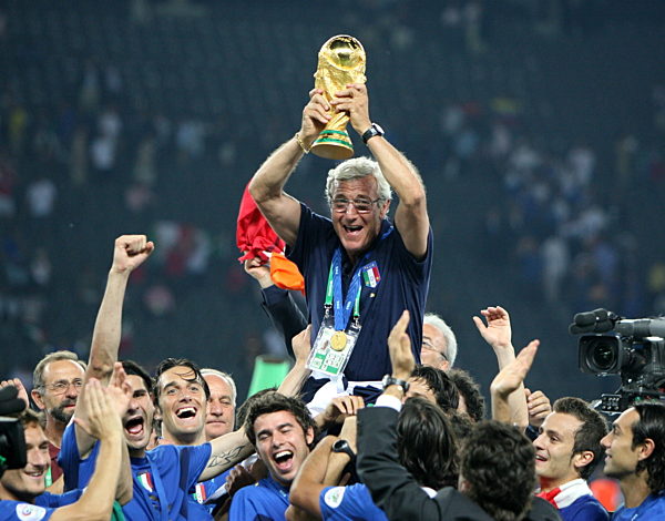 Italian national coach Marcello Lippi (up) celebrates with the World Cup...