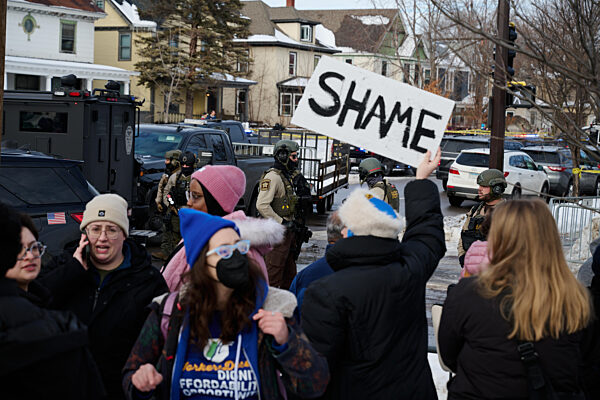 Police Secure Scene After Woman Shot During ICE Operation In South Minneapolis