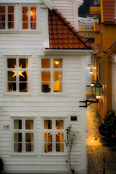 House looking 'hygge' (cosy) with Nordic Christmas star lanterns on Tvedtegarden, Sliberget Street. Bergen; Hordaland; Norway