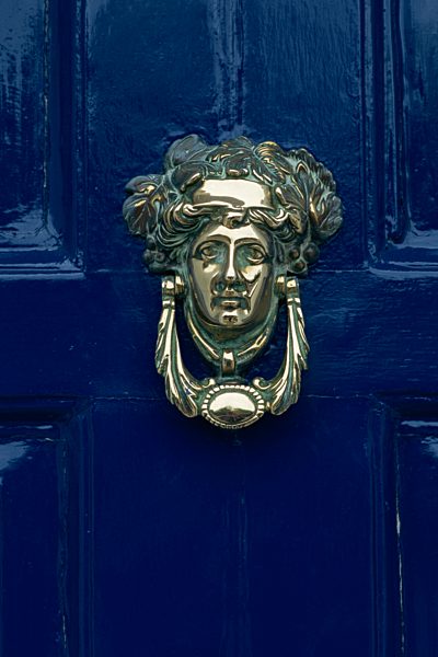 Blue painted door and knocker in the centre of the city of Dublin, Eire, Europe