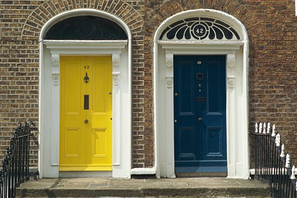 Two doorways with painted doors on Bride Street in Dublin, Eire, Europe