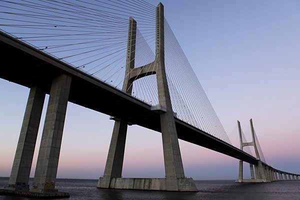 Dusk at the Vasco da Gama Bridge over the River Tagus (Rio Tejo) in Lisbon, Portugal, Europe