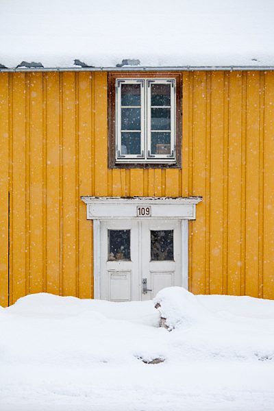 Traditional wooden buildings along Storgata in the quaint area of Tromso, in the Arctic Circle in Northern Norway