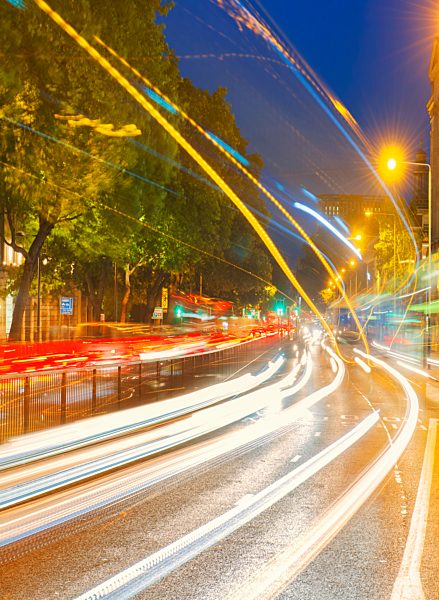Streams of car headlights at night, London