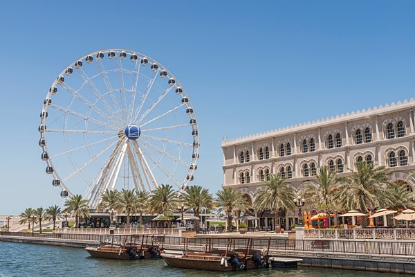 Eye of the Emirates and cafes in Sharjah, United Arab Emirates
