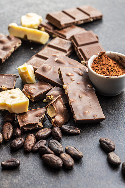 Milk chocolate bars. Dark and white nut chocolate