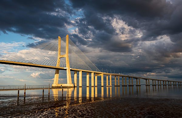 Vasco da Gama Bridge at sunset in Lisbon, Portugal