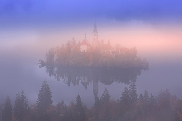 Bled, Slovenia view with church, misty morning