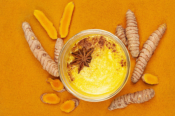 Traditional indian drink turmeric latte or golden milk.