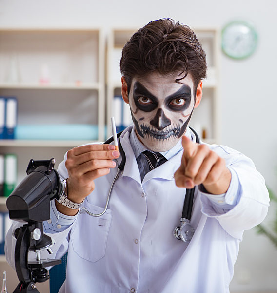Scary monster doctor working in lab