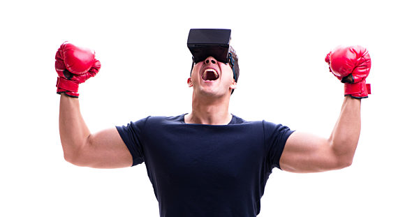 Man playing with virtual reality glasses on white background