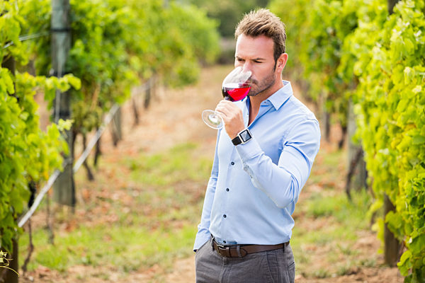 Man drinking red wine