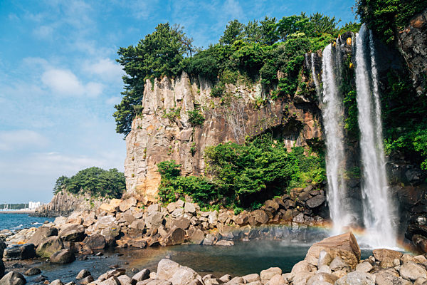 Jeongbang Falls and sea in Jeju Island, Korea