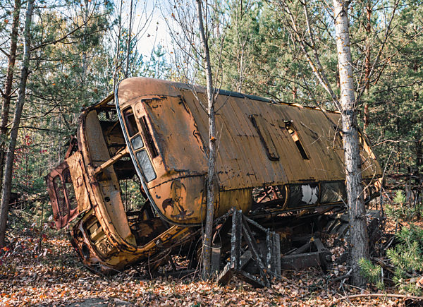 abandoned broken equipment in the Chernobyl forest