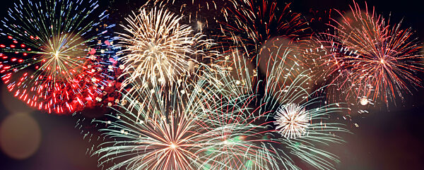 Abstract colored firework on dark sky. Celebration and anniversary concept