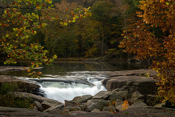 Framed view of the Valley Falls on a misty autumn day