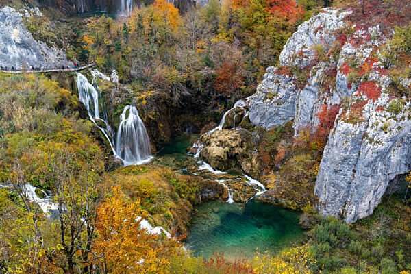 A view of the great waterfalls in Plitivice with vibrant and colorful fall color foliage