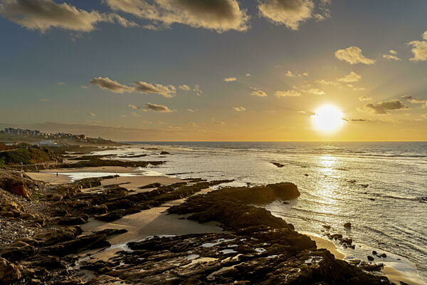 The Sun Sets Over The Mediterranean Sea In Morocco