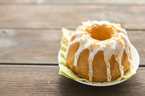 sweet garnished easter cake wooden table. High quality and resolution beautiful photo concept