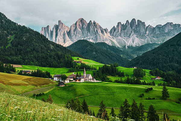 Panoramic view of the Church of St. Magdalena in the Dolomites