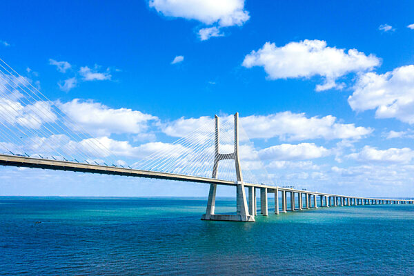 Famous Vasco da Gama Bridge over River Tejo in Lisbon from above