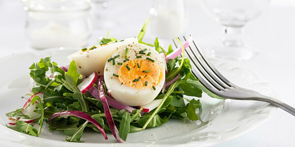 healthy salad with egg white plate