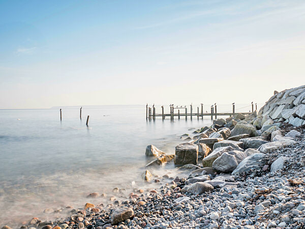 Pillars and poles of port mole in fishing Village of Vitt near Kap Arkona