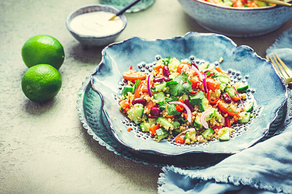 Healthy quinoa black bean salad with fresh tomatoes