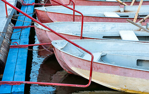 several old boats near the pier
