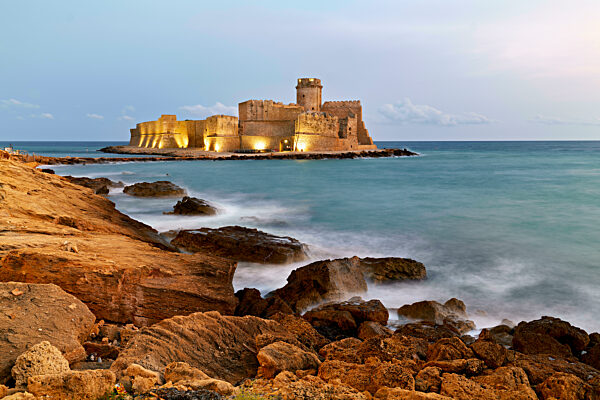 Isola di Capo Rizzuto. Calabria Italy. The Aragon castle at Le Castella at dusk.