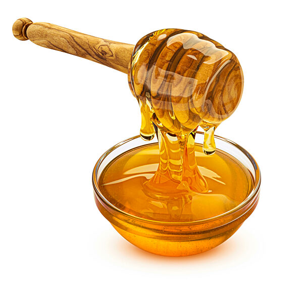 Honey dipper isolated on white background, full depth of field