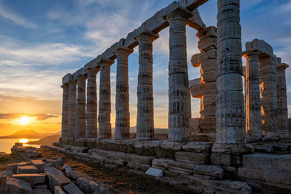 Poseidon temple ruins on Cape Sounio on sunset, Greece
