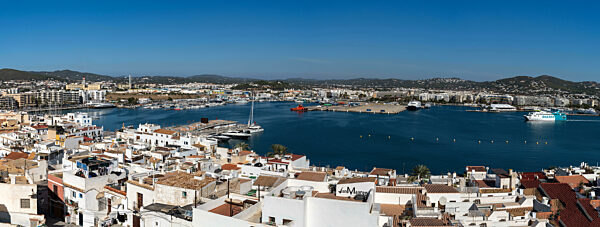 panorama view of Eivissa town and harbour with a ferry arriving in port