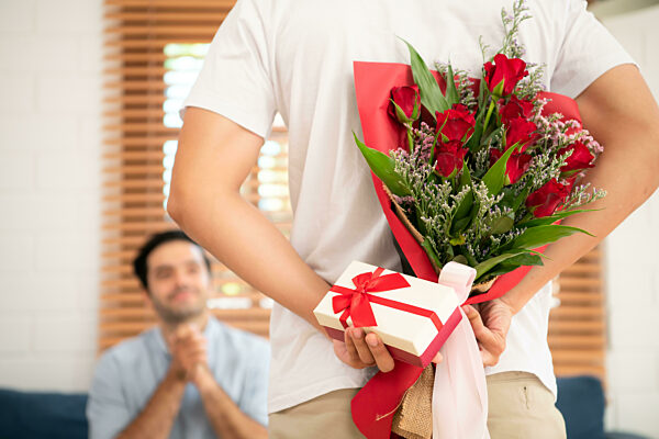 LGBT Young surprises boyfriend with roses and gifts