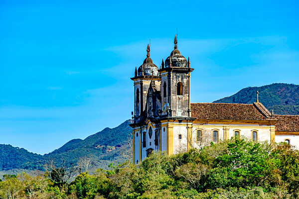 Church tower amidst the vegetation