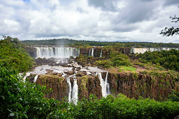 Powerful Iguazu Falls, one of the world most impressive waterfalls. Brazil side. Brazilian wilderness landscape.