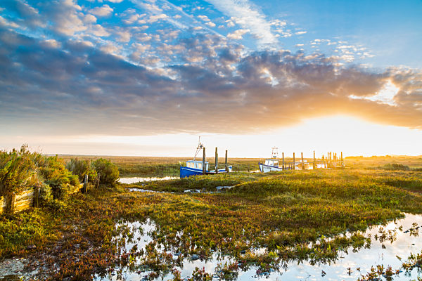 Sunrise over the marshes on the North Norfolk coast.