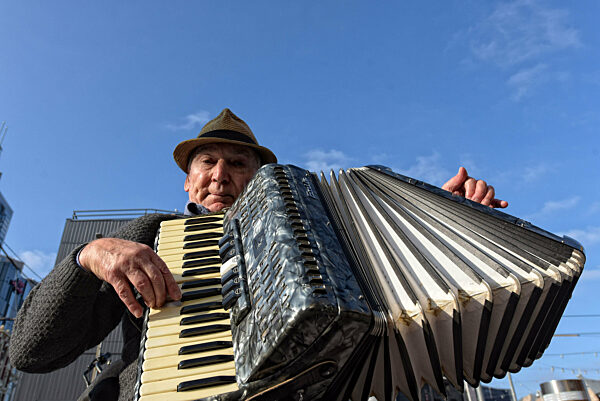 People enjoying the pleasant weather at Alexandra Gardens during winter season in city of Melbourne