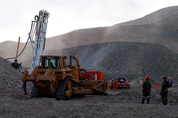 Rescuers reach 300 meters of trapped miners in Chile