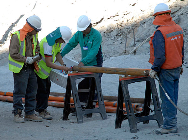 Development of the rescue work of the trapped miners alive.