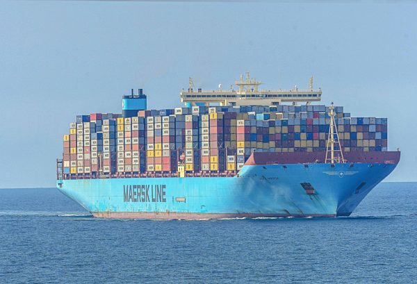 A full-loaded freighter (container ship) goes on the North Sea