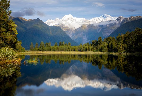 Mount Tasman and Aoraki (Mount Cook) reflected in Lake Matheson, South Island, New Zealand, Pacific