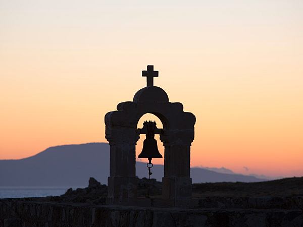Silhouette of church bell-tower within the Fortezza, sunset, Rethymno, aka Rethymnon, Crete, Greece